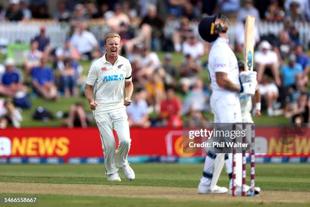 Scott Kuggeleijn of New Zealand celebrates his wicket of Ben Stokes of England during day one of the First Test match in the series between the New...