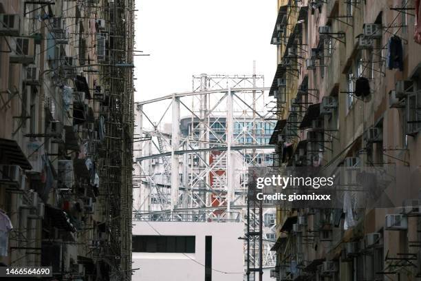 towngas gasometer viewed from the 13th streets, kowloon city, hong kong - gas container stock pictures, royalty-free photos & images