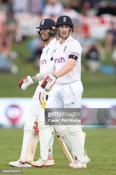 Harry Brook and Ben Foakes of England walk off for tea during day one of the First Test match in the series between the New Zealand Blackcaps and...