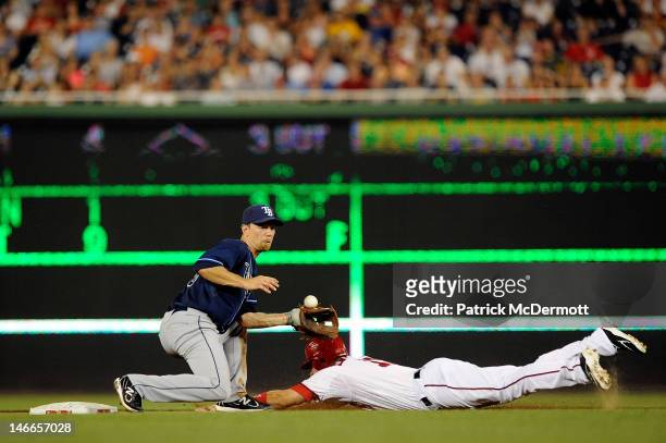 Ryan Zimmerman of the Washington Nationals steals second base against Ben Zobrist of the Tampa Bay Rays during the seventh inning at Nationals Park...