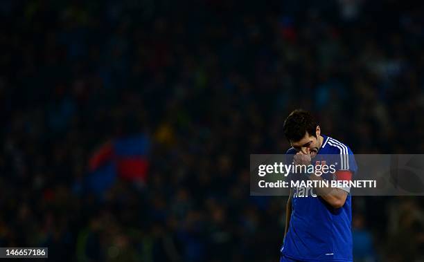 Footballer Jose Rojas of Chile's team Universidad de Chile shows his dejection at the end of the Libertadores Cup second leg semifinal match against...