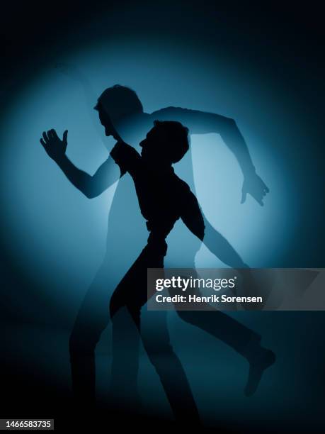 silhouette of male - double exposure running stock pictures, royalty-free photos & images