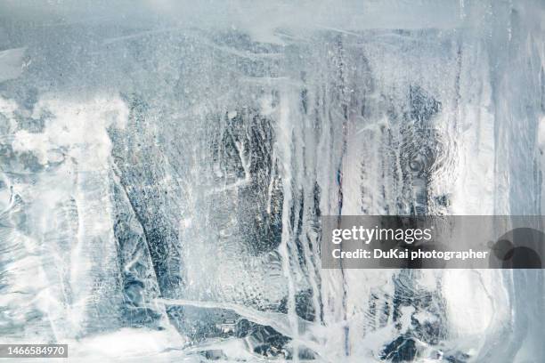 ice brick - artificial ice stock pictures, royalty-free photos & images