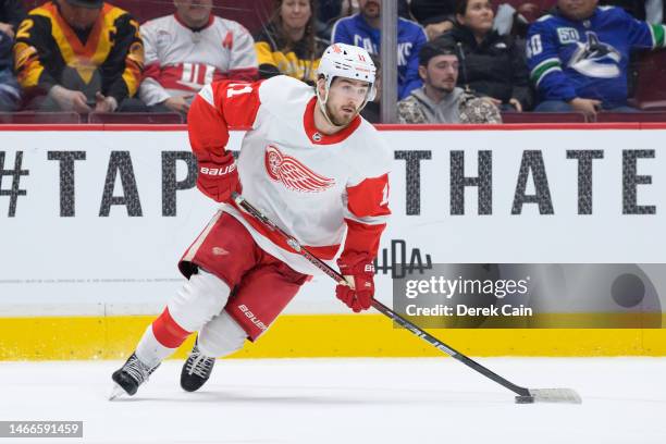 Filip Zadina of the Detroit Red Wings skates with the puck during the third period of their NHL game against the Vancouver Canucks at Rogers Arena on...