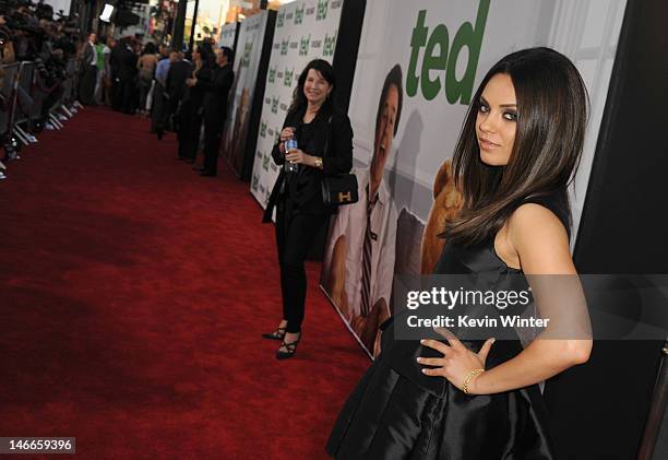 Actress Mila Kunis arrives at the Premiere of Universal Pictures' "Ted" sponsored in part by AXE Hair at Grauman's Chinese Theatre on June 21, 2012...