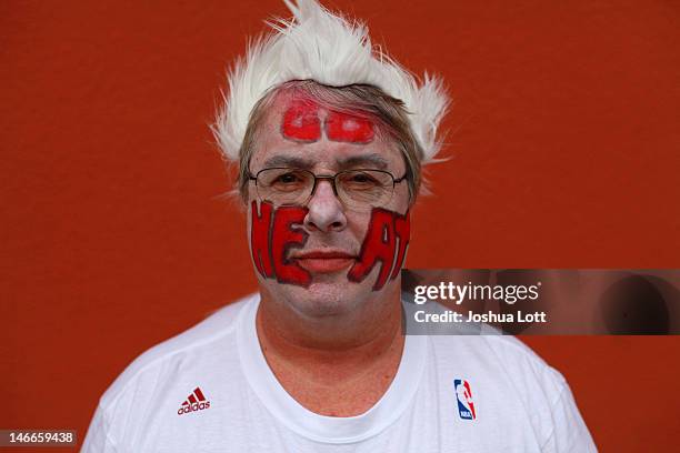 Jon Simpkins shows off his face paint as he poses for a portrait before game five of the 2012 NBA finals between the Oklahoma City Thunder and Miami...
