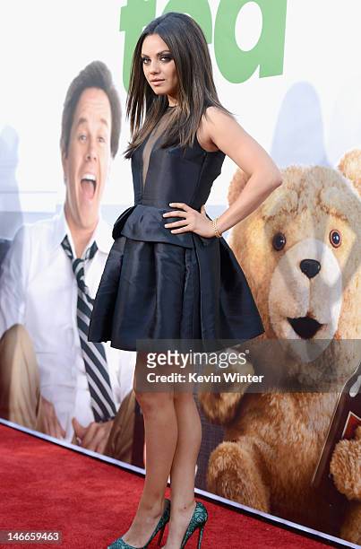 Actress Mila Kunis arrives at the Premiere of Universal Pictures' "Ted" sponsored in part by AXE Hair at Grauman's Chinese Theatre on June 21, 2012...