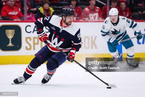 Evgeny Kuznetsov of the Washington Capitals skates with the puck against the San Jose Sharks during the third period of the game at Capital One Arena...