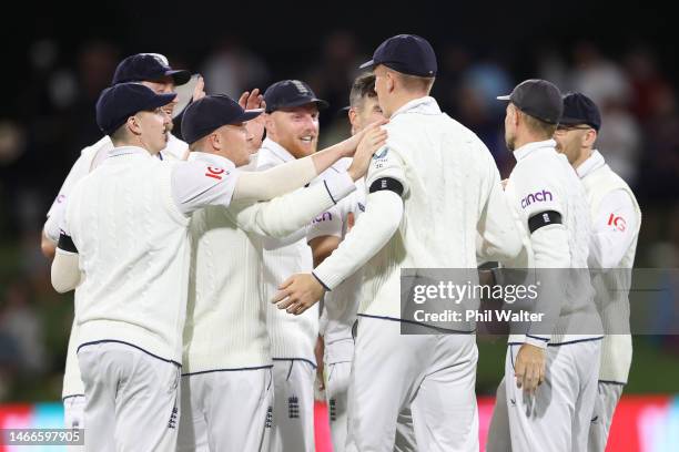 England celebrate the wicket of Henry Nicholls of New Zealand during day one of the First Test match in the series between the New Zealand Blackcaps...