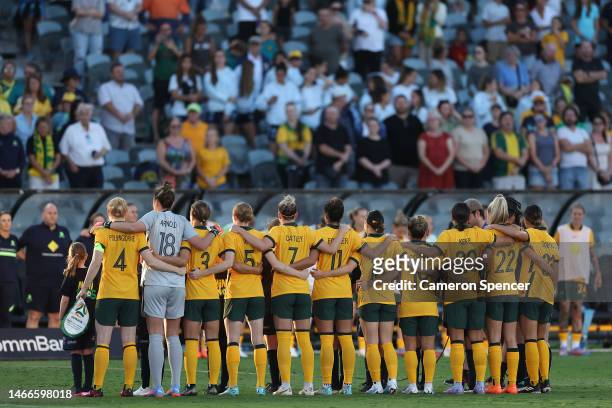Team Matildas line up sing the national anthem during the Cup of Nations match between the Australia Matildas and Czechia at Industree Group Stadium...