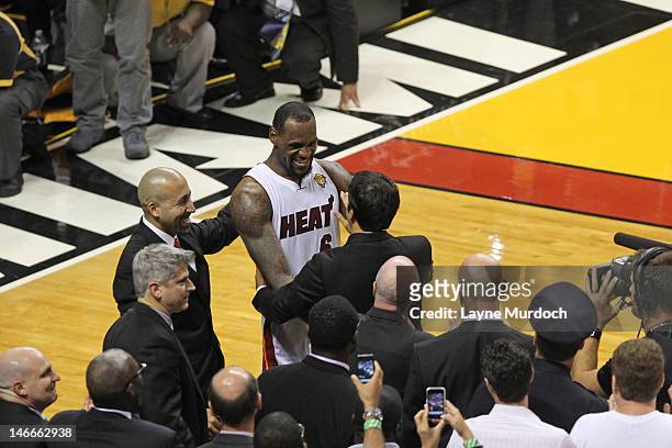 LeBron James celebrates with Head Coach Erik Spoelstra as their team wins the NBA Championship by defeating the Oklahoma City Thunder in Game Five of...