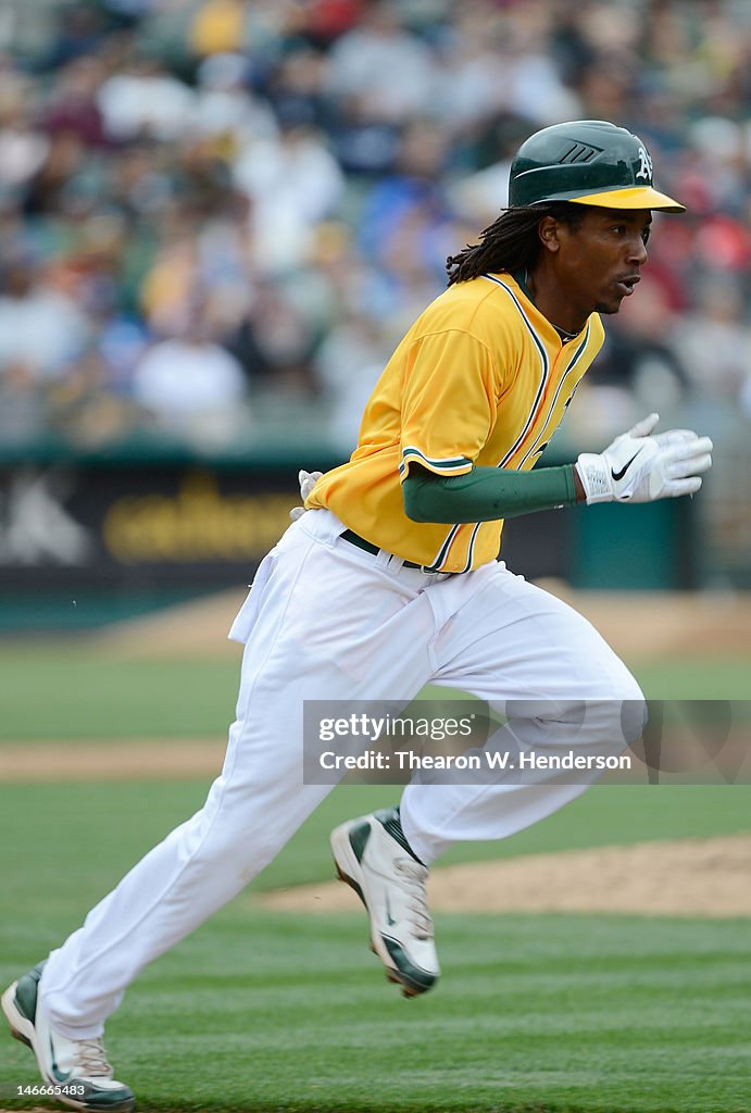 Jemile Jemile Weeks runs torwards first base against the Los Angeles Dodgers ...