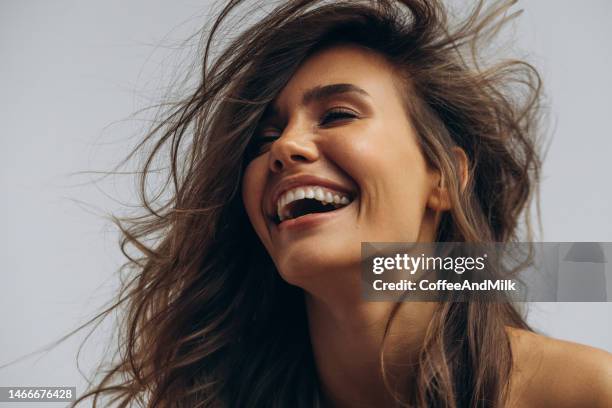 beautiful emotional woman with natural make-up - smiling face stockfoto's en -beelden