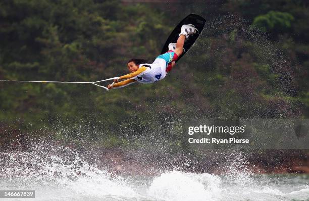 Zhenkun Duan of China competes in the Waterski Women's Wakeboard Final on Day 6 of the 3rd Asian Beach Games Haiyang 2012 at Jiulong Lake on June 22,...
