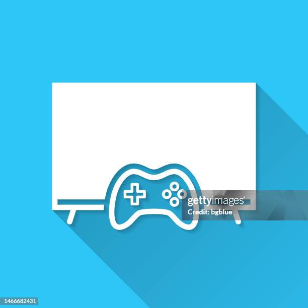 tv with gamepad. icon on blue background - flat design with long shadow - pc gaming controller stock illustrations