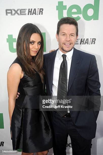 Mila Kunis and Mark Wahlberg arrive for the premiere of "Ted" at Grauman's Chinese Theatre on June 21, 2012 in Hollywood, California.