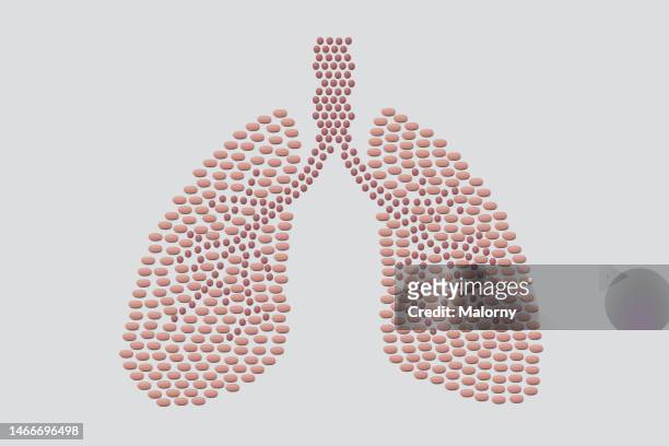 pills in the shape of a human lungs. - respiratory infection stock pictures, royalty-free photos & images