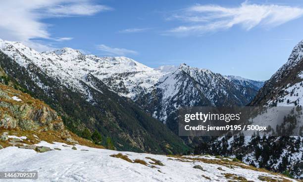 scenic view of snowcapped mountains against sky,aragon,spain - aragon stock pictures, royalty-free photos & images