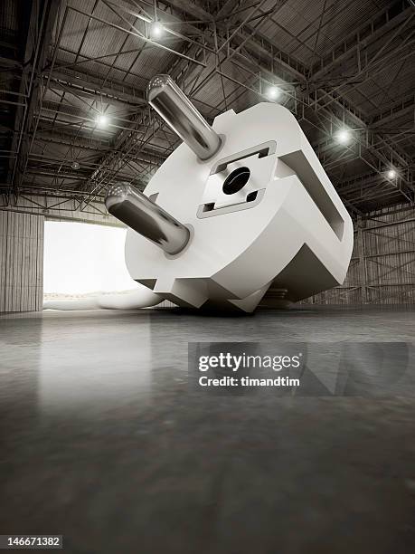 giant european plug in a hangar - too big stock pictures, royalty-free photos & images