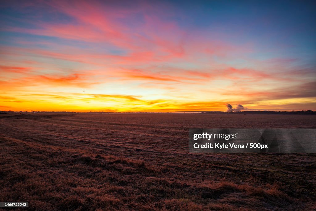 Scenic view of field against sky during sunset,Arkansas,United States,USA