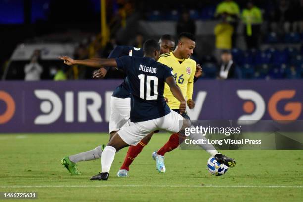 Ecuador's Patrickson Delgado and Colombia's Oscar Cortes during the CONMEBOL U-20 tournament match between Brazil and Paraguay in Bogota, Colombia,...
