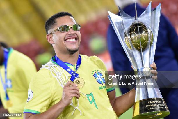 Brazil's Vitor Roque poses for a photo with the champions trophy after winning the South American U-20 Conmebol Tournament match between Brazil and...