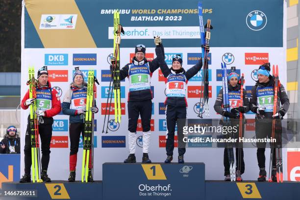Silver medalists David Komatz of Austria and Lisa Theresa Hauser of Austria, gold medalists Johannes Thingnes Boe of Norway and Marte Olsbu...