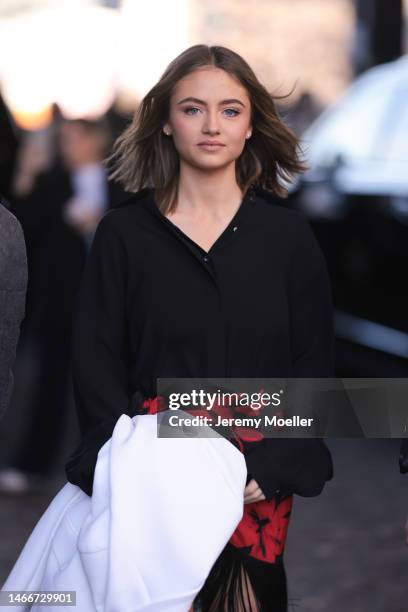 Leni Klum seen wearing a black oversized blouse, a white blazer, a red flowered skirt and black heels before the Michael Kors show on February 15,...