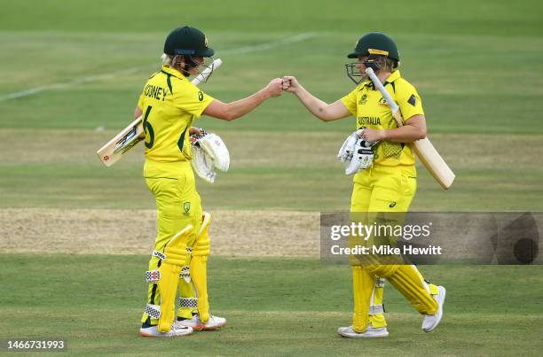 Beth Mooney and Alyssa Healy of Australia celebrate following the ICC Women's T20 World Cup group A match between Sri Lanka and Australia at St...