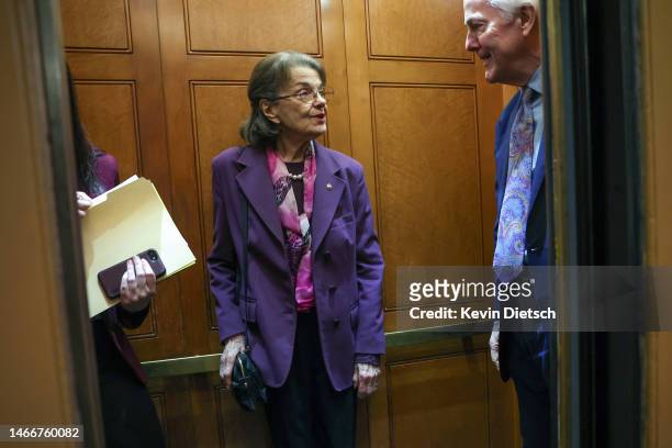 Sen. Dianne Feinstein talks to Sen. John Cornyn as they board an elevator at the U.S. Capitol on February 16, 2023 in Washington, DC. The Senate is...
