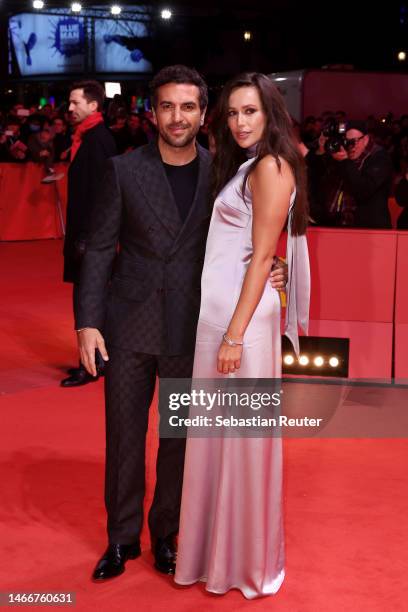 Elyas M'Barek and his wife Jessica M'Barek attends the "She Came to Me" premiere and Opening Ceremony red carpet during the 73rd Berlinale...