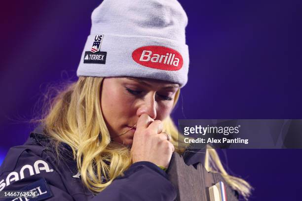 Gold medalist Mikaela Shiffrin of United States reacts and holds her locket during the medal ceremony for Women's Giant Slalom at the FIS Alpine...