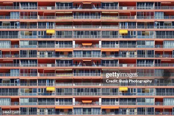 composite image of facade of mediterranean apartment building - canary bird stock pictures, royalty-free photos & images