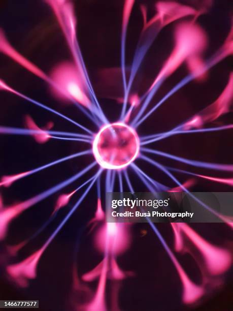 plasma sphere with colored electric lightning - electricity stock pictures, royalty-free photos & images