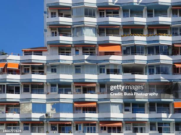 vacation condominium apartment building in tenerife - canary bird stock pictures, royalty-free photos & images