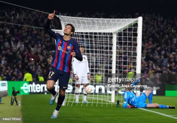 Marcos Alonso of FC Barcelona celebrates after scoring the team's first goal during the UEFA Europa League knockout round play-off leg one match...