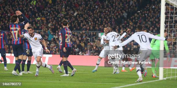 Bruno Fernandes, Casemiro, Aaron Wan-Bissaka, Marcus Rashford of Manchester United celebrate Jules Kounde scoring an own goal during the UEFA Europa...