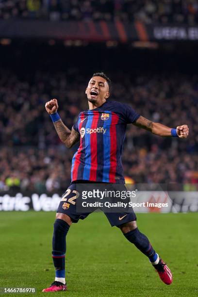 Raphinha of FC Barcelona celebrates after scoring his team's second goal during the UEFA Europa League knockout round play-off leg one match between...