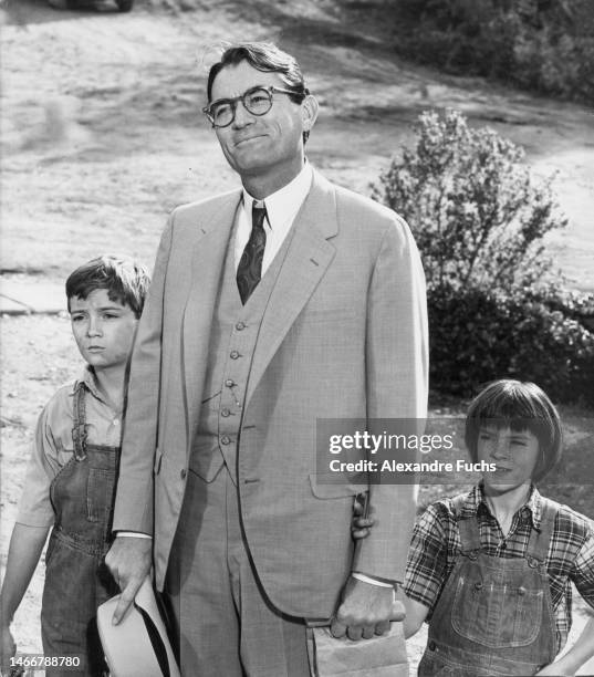 Actors Gregory Peck, Johan Megna and actress Mary Badham in a scene of To Kill A Mockingbird, in 1961 at Monroeville, Alabama.