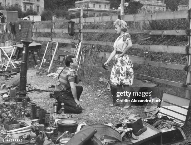 Actress Sandra Dee goofing with actor Bobby Darin while filming Come September in Portofino, Italy, in 1960.