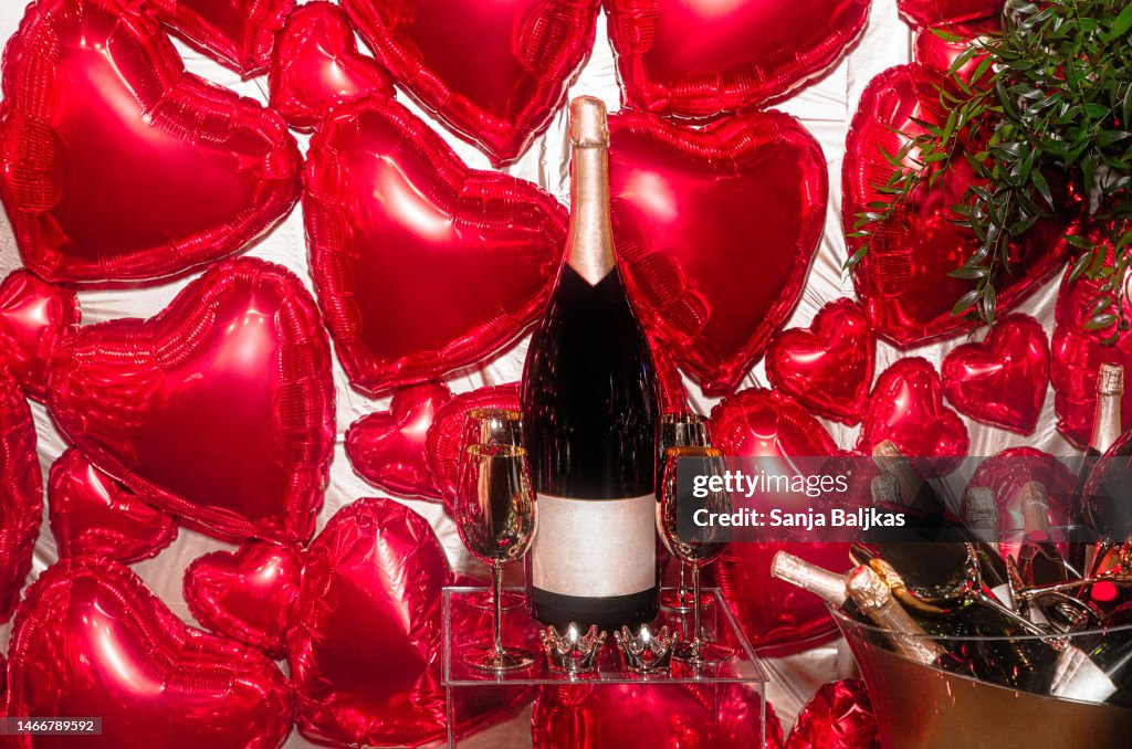 Champagne and heart balloons