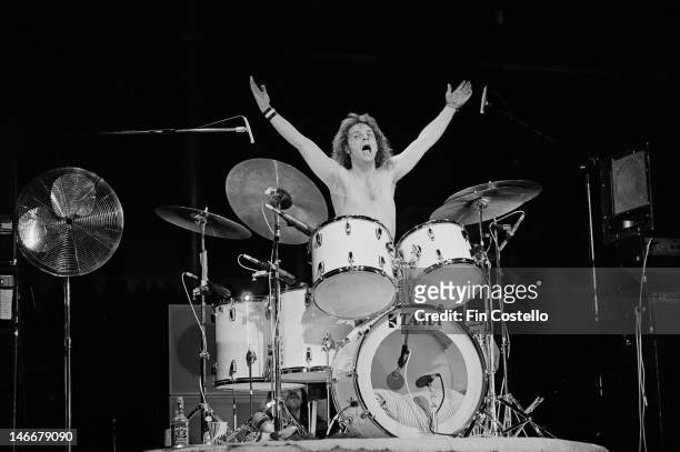 8th MAY: Joey Kramer from Aerosmith performs live on stage at the Pontiac Silverdome in Pontiac, Michigan during their US tour on 8th May 1976.