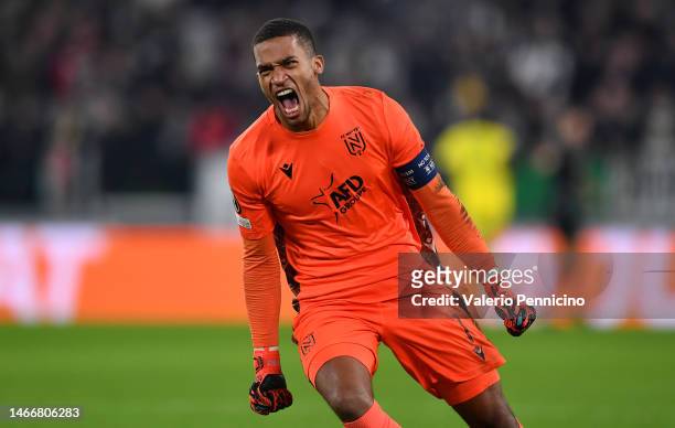 Alban Lafont of FC Nantes celebrates after the team's first goal during the UEFA Europa League knockout round play-off leg one match between Juventus...