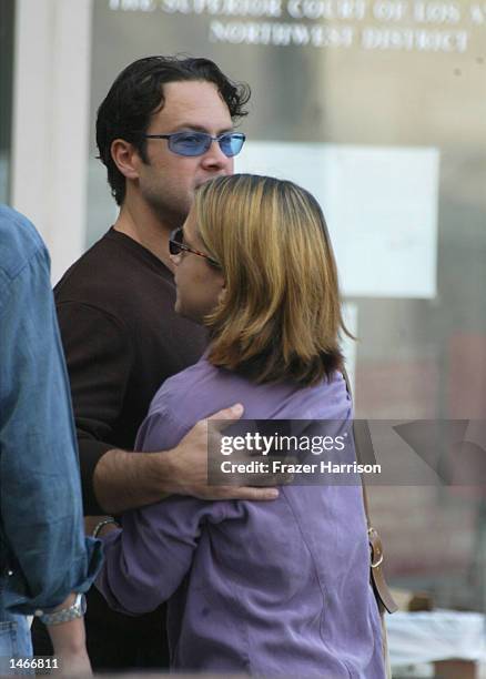 Robert Blakes daughter Delinah and son Noah hug outside the Van Nuys Courthouse before for a hearing in the case of actor Robert Blake on October 9,...