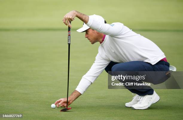 Nick Taylor of Canada lines up a putt on the 13th green during the first round of the The Genesis Invitational at Riviera Country Club on February...