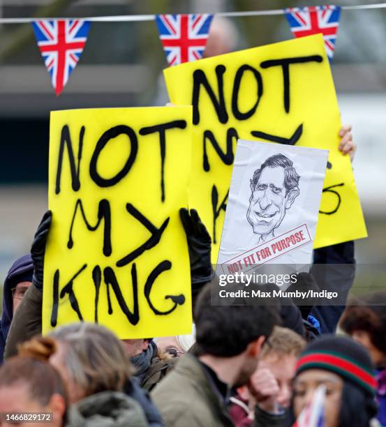 Anti monarchy protestors from the pressure group Republic wave 'Not My King' banners ahead of King Charles III's visit to the Church of Christ the...