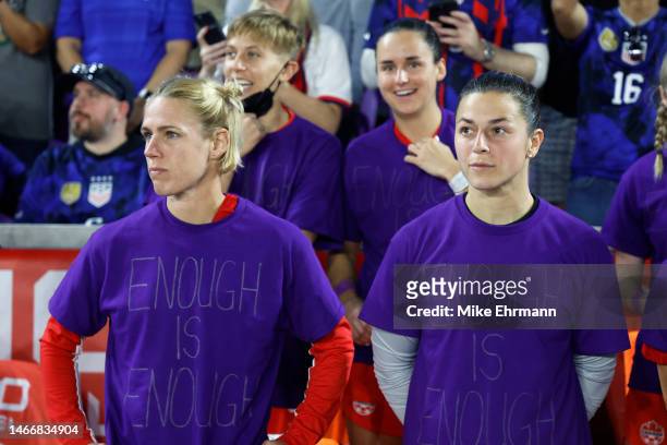 Sophie Schmidt and Sabrina D'Angelo of Canada look on as they wear purple shirts that read, "Enough is Enough" prior to the 2023 SheBelieves Cup...