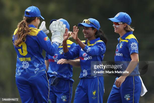 Jannatul Sumona of the Meteors celebrates taking the wicket of Tess Flintoff of Victoria during the WNCL match between ACT and Victoria at EPC Solar...
