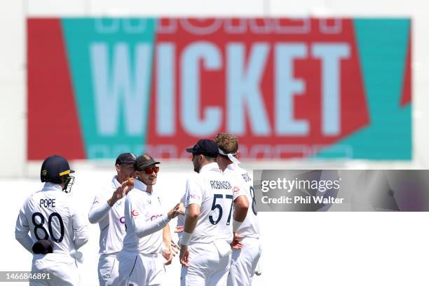 Joe Root of England celebrates the wicket of Neil Wagner of New Zealand during day two of the First Test match in the series between the New Zealand...