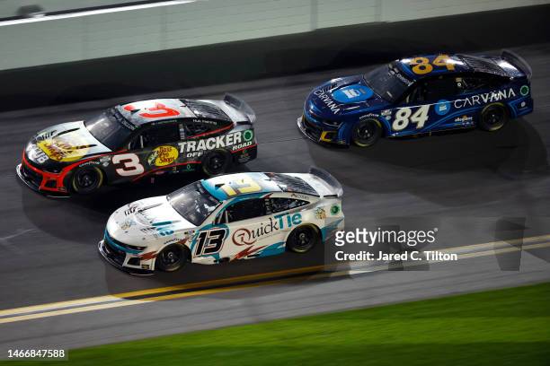 Chandler Smith, driver of the Quick Tie Inc. Chevrolet, Austin Dillon, driver of the Bass Pro Shops Club Chevrolet, and Jimmie Johnson, driver of the...